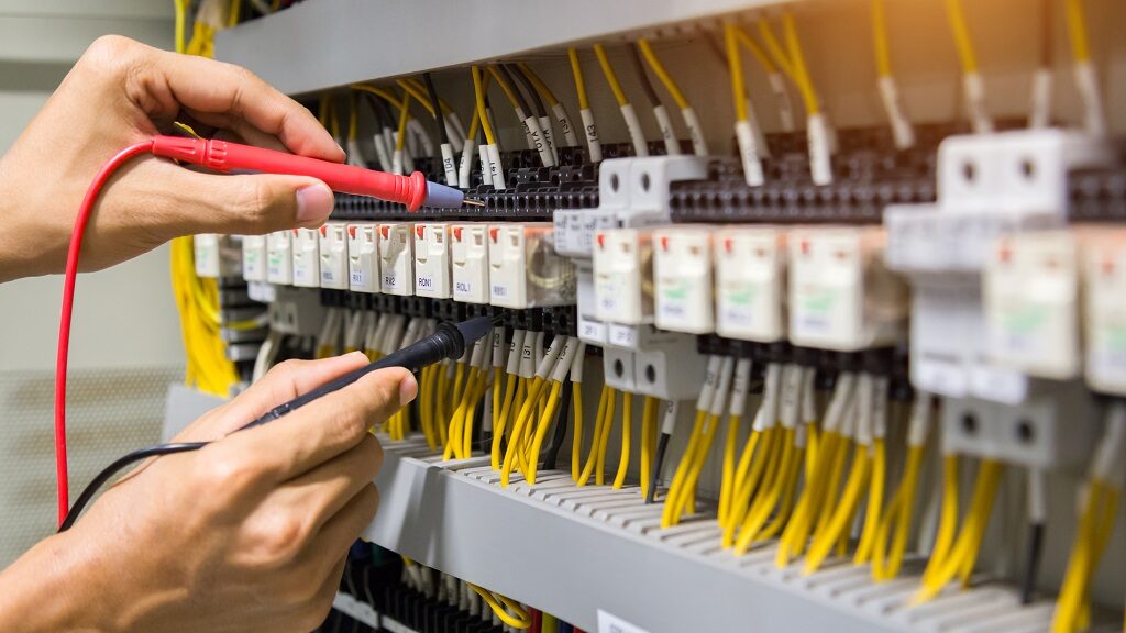 An electrical engineer putting their skills to work