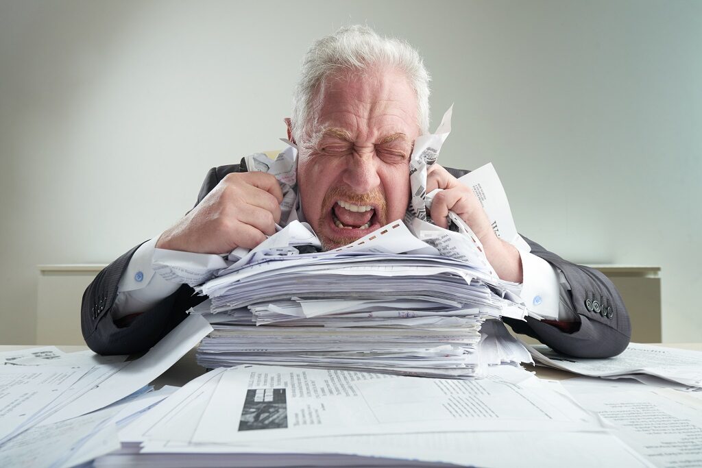 A manager destroys reports as a result of work related mental health issues.
